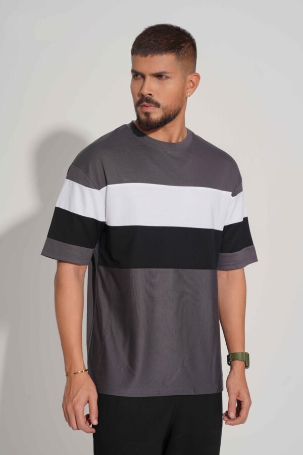 man wearing drop shoulder t shirt