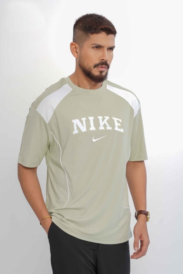 Man wearing green casual t-shirt